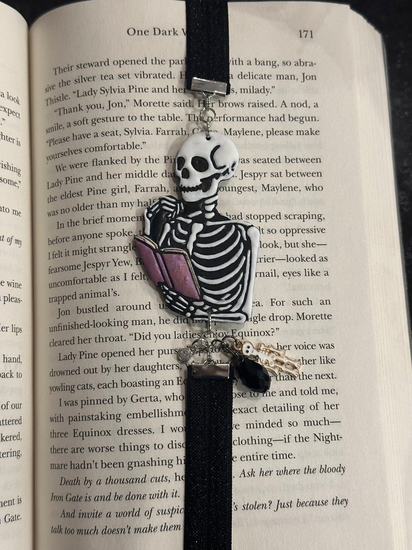 Spooky Skeleton Reading a Book – Handmade Polymer Clay Elastic Bookmark with Beads & Charms