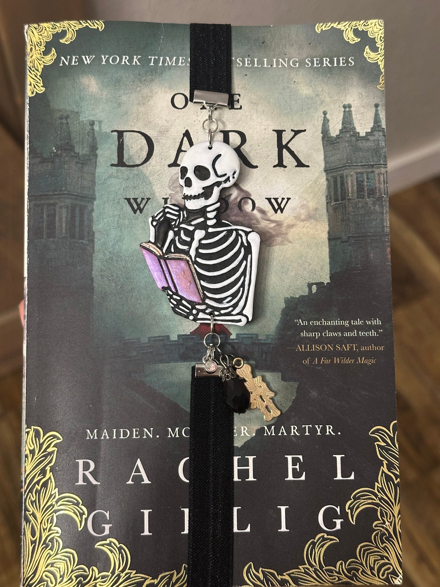 Spooky Skeleton Reading a Book – Handmade Polymer Clay Elastic Bookmark with Beads & Charms