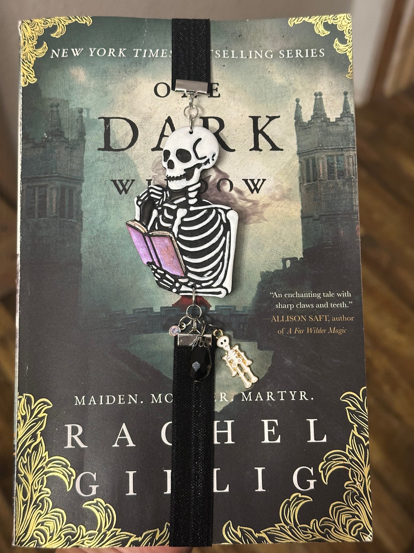 Spooky Skeleton Reading a Book – Handmade Polymer Clay Elastic Bookmark with Beads & Charms