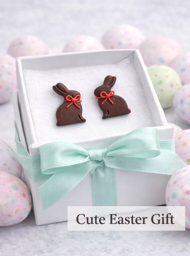 Handmade chocolate bunny stud earrings made from polymer clay with a red bow, cute Easter bunny jewelry.